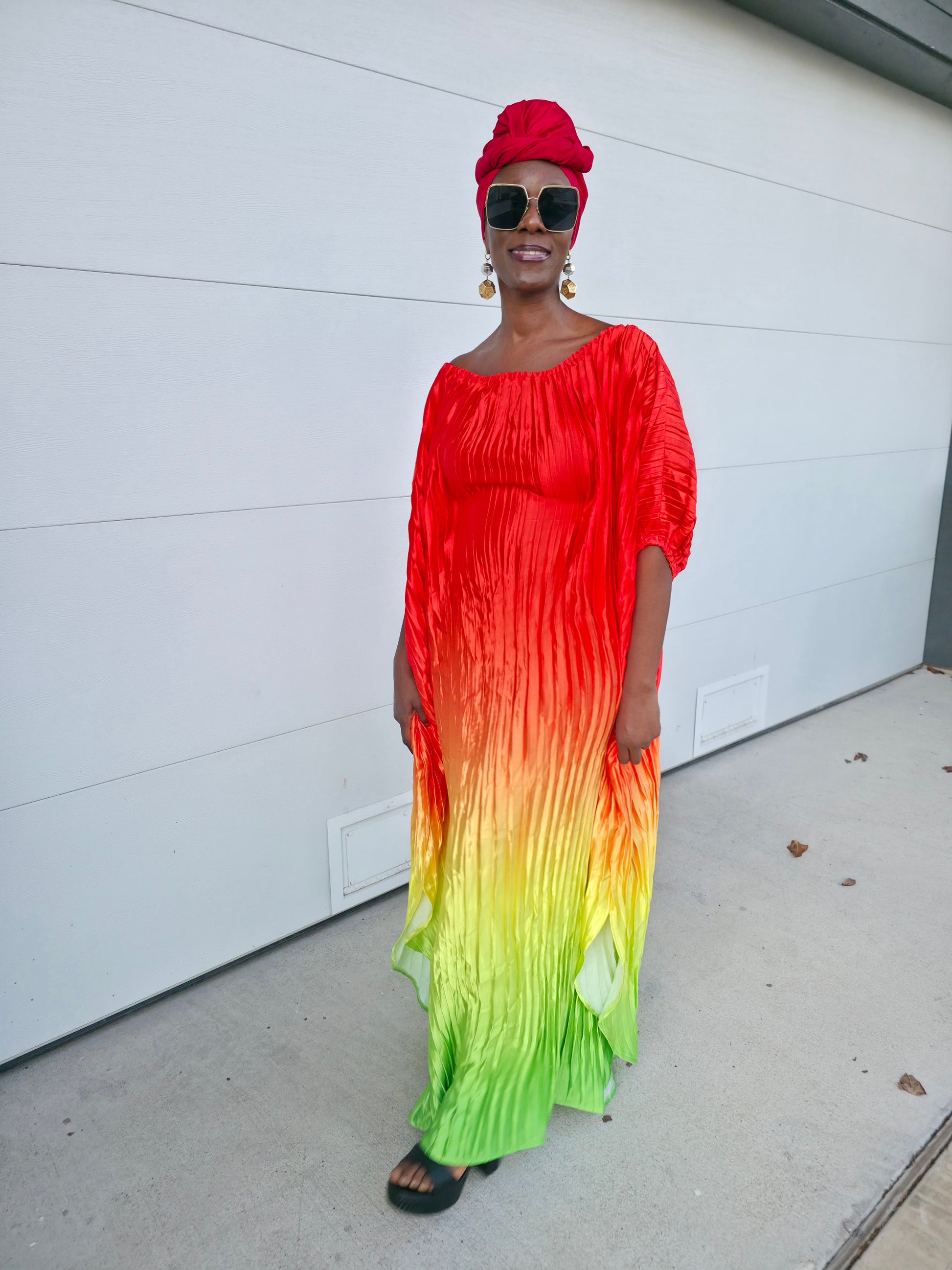 Pleated Ombre Kaftan available in red-green, yellow-pink, and pink-blue gradients, featuring a wide neckline and a flowing Boubou silhouette.