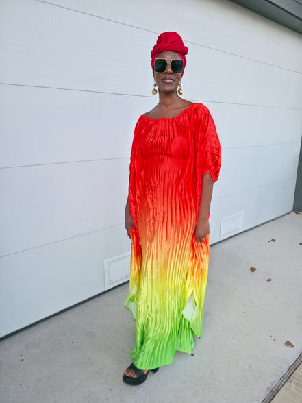 Pleated Ombre Kaftan available in red-green, yellow-pink, and pink-blue gradients, featuring a wide neckline and a flowing Boubou silhouette.