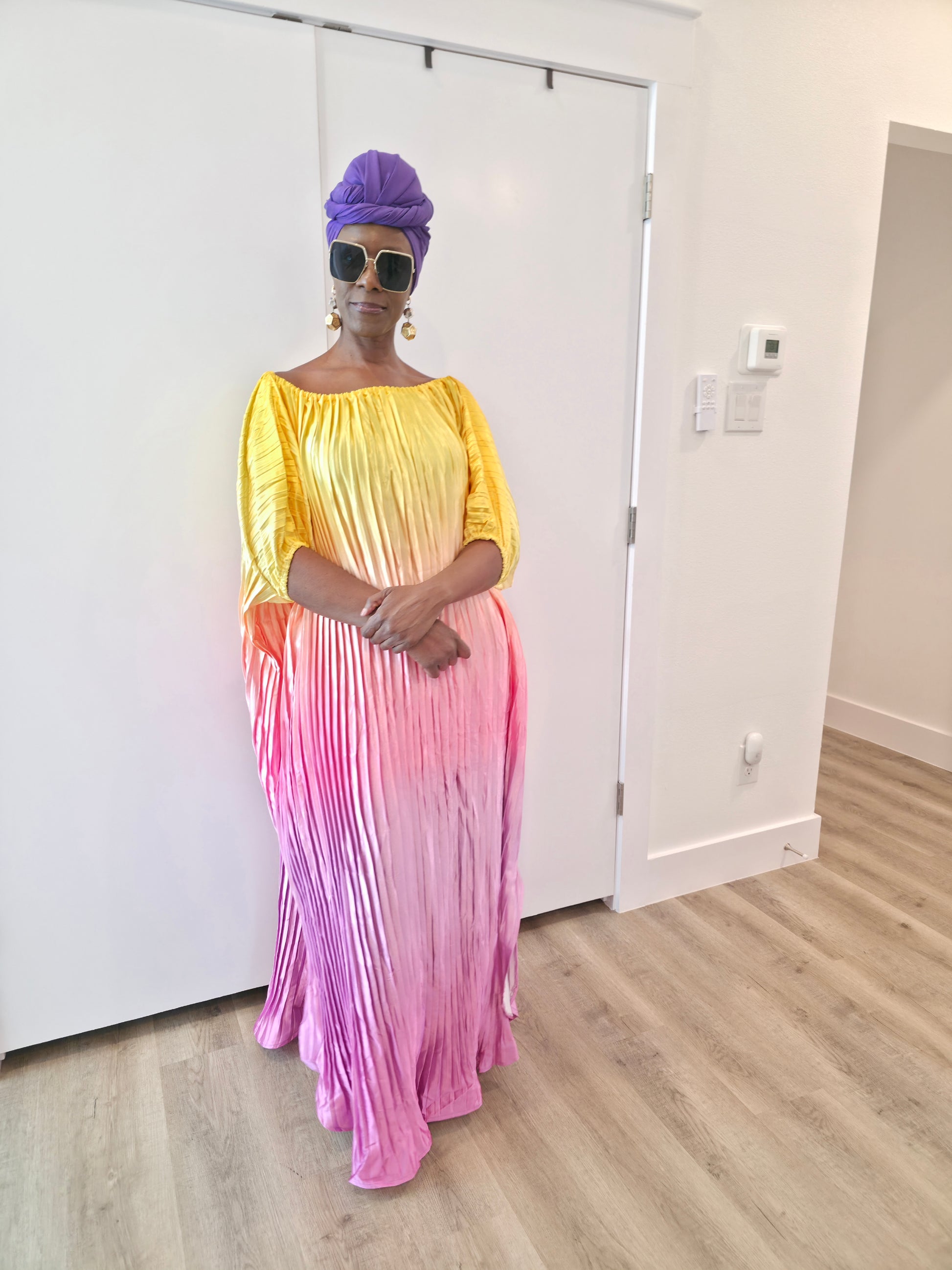 Pleated Ombre Kaftan available in red-green, yellow-pink, and pink-blue gradients, featuring a wide neckline and a flowing Boubou silhouette.