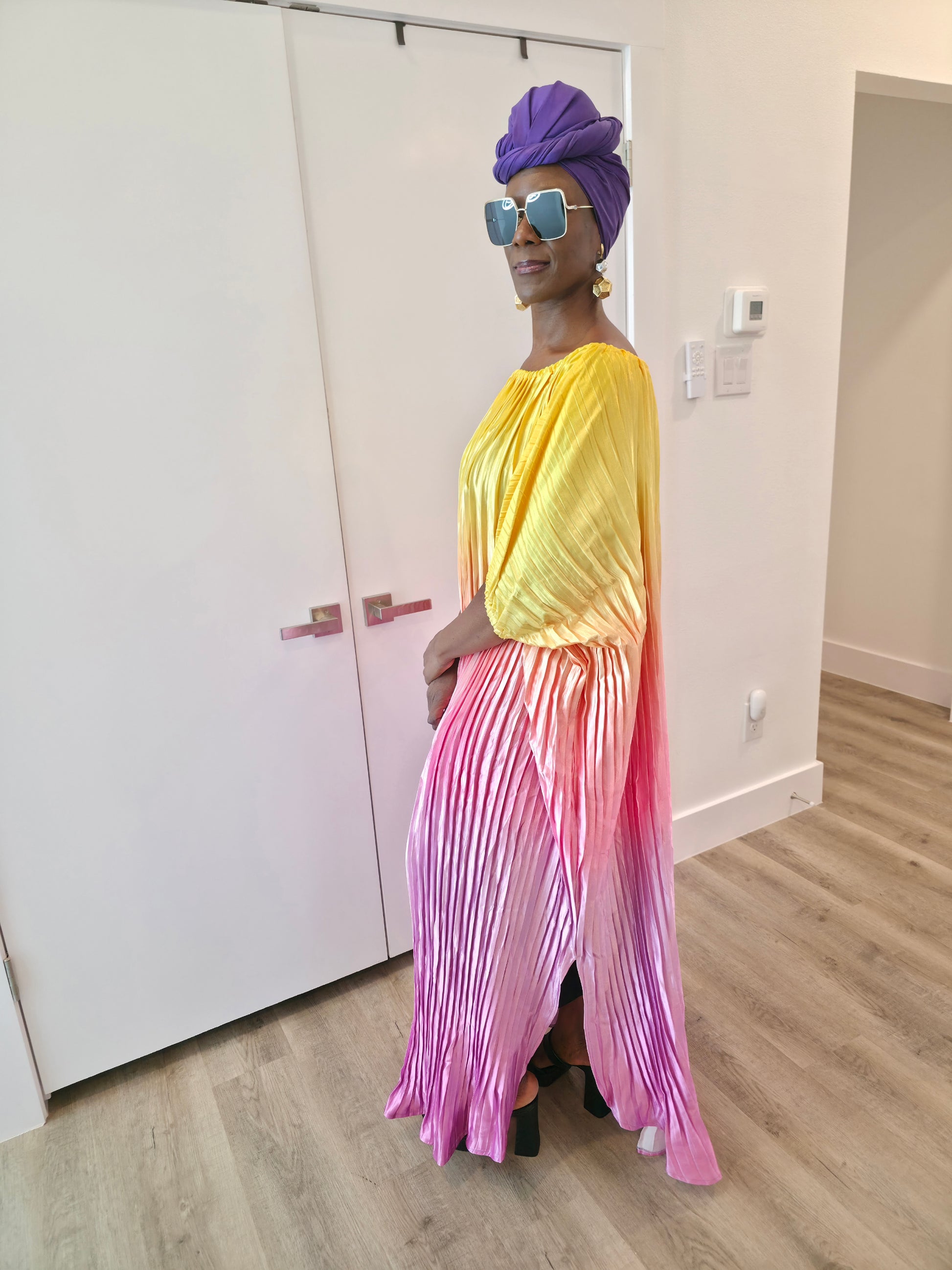 Pleated Ombre Kaftan available in red-green, yellow-pink, and pink-blue gradients, featuring a wide neckline and a flowing Boubou silhouette.