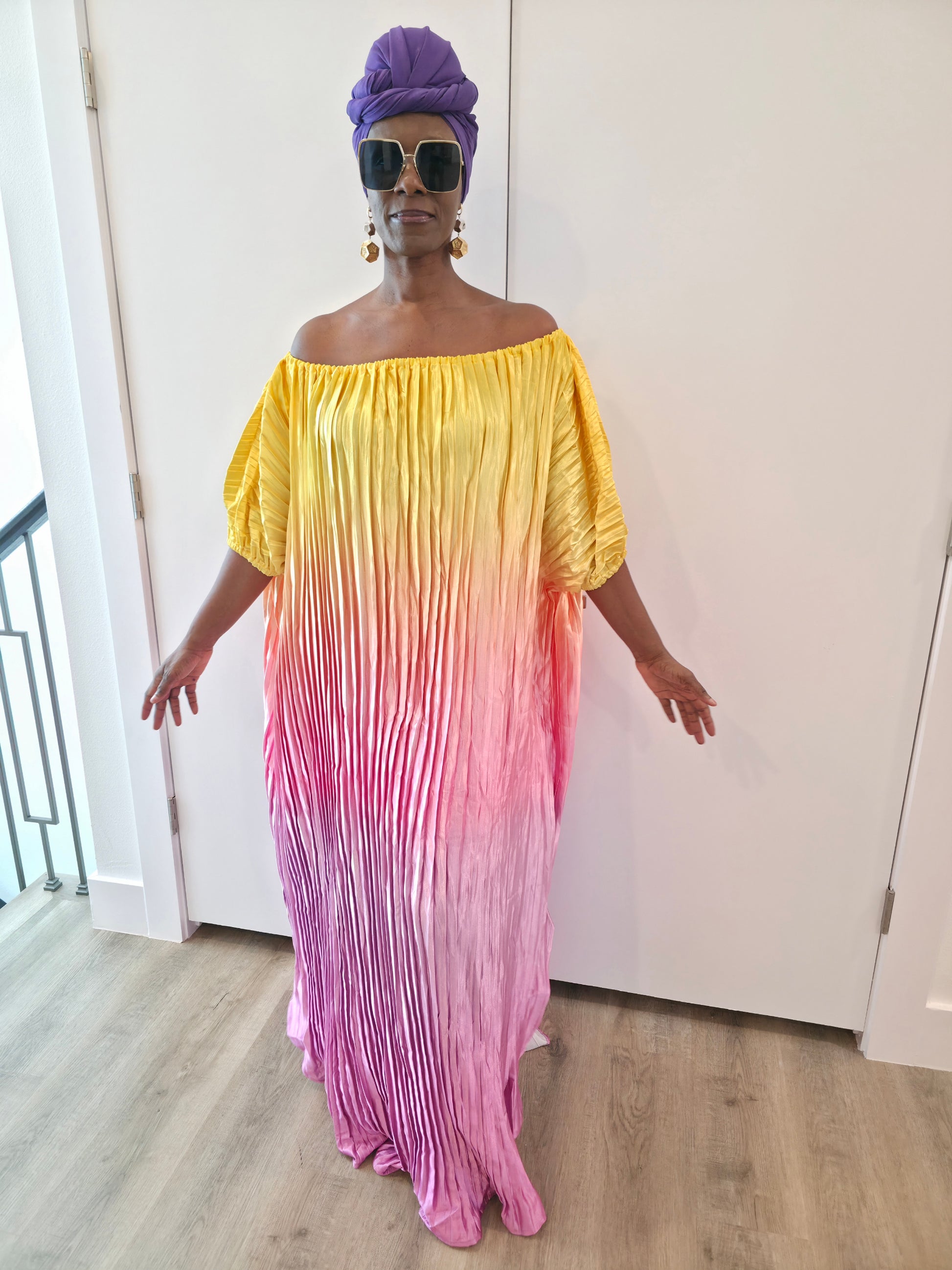 Pleated Ombre Kaftan available in red-green, yellow-pink, and pink-blue gradients, featuring a wide neckline and a flowing Boubou silhouette.