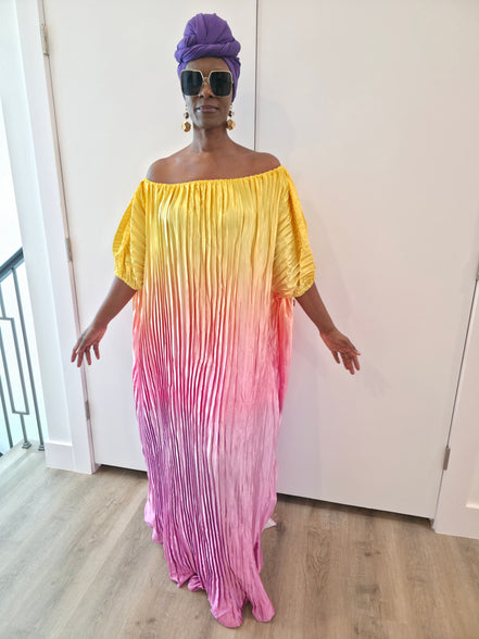 Pleated Ombre Kaftan available in red-green, yellow-pink, and pink-blue gradients, featuring a wide neckline and a flowing Boubou silhouette.