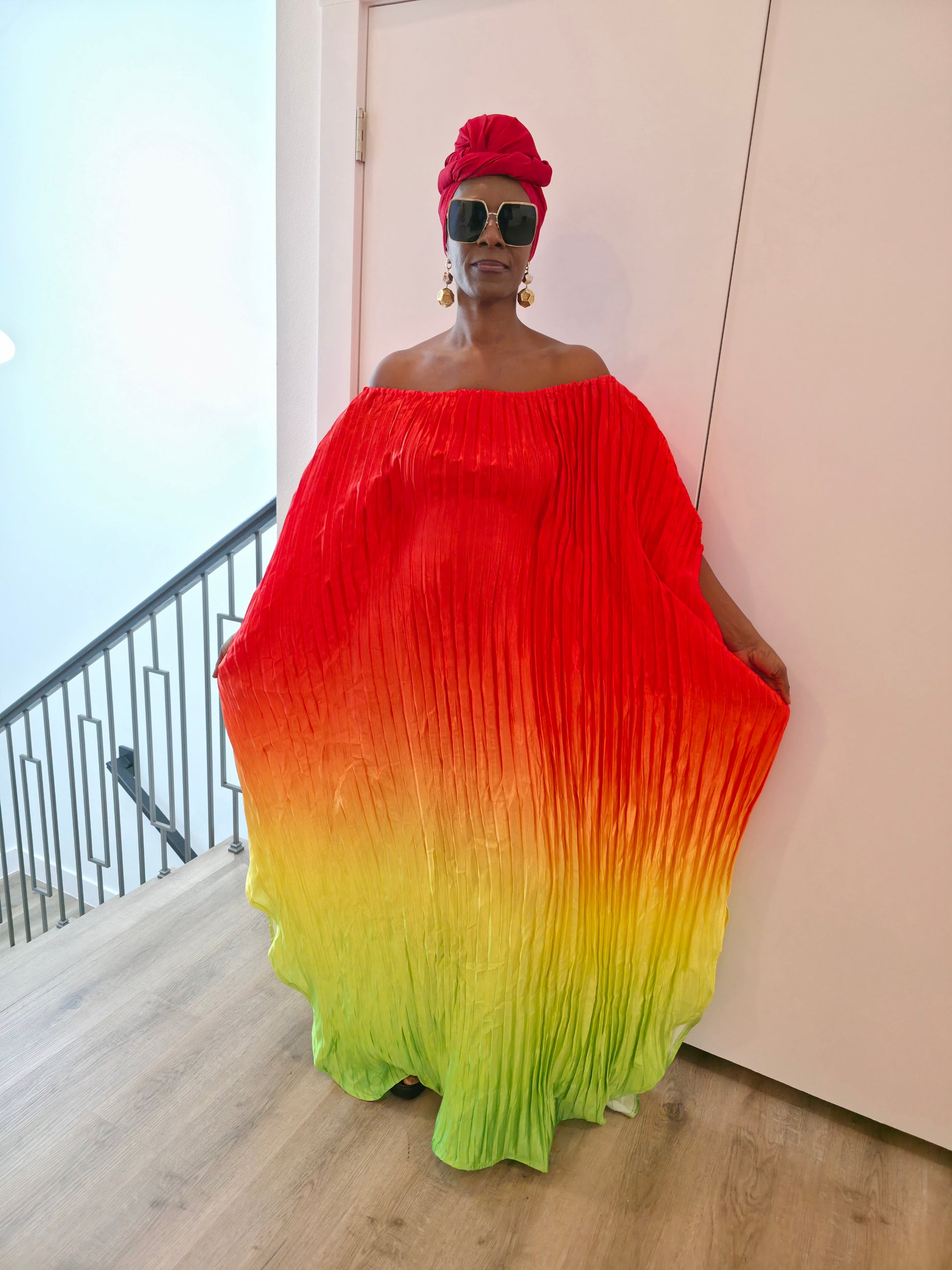 Pleated Ombre Kaftan available in red-green, yellow-pink, and pink-blue gradients, featuring a wide neckline and a flowing Boubou silhouette.