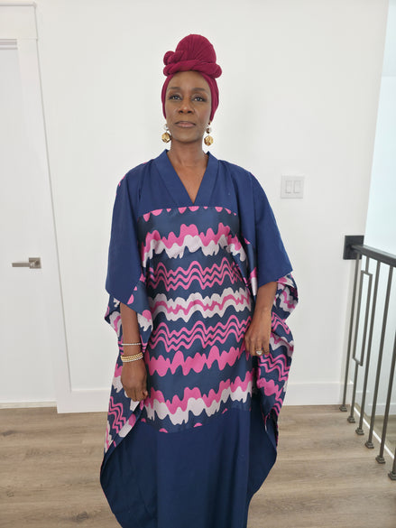 Cosmic Candy Boubou Kaftan in navy blue featuring a central horizontal panel with pink and lavender wavy patterns and a V-neck collar.