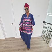 Cosmic Candy Boubou Kaftan in navy blue featuring a central horizontal panel with pink and lavender wavy patterns and a V-neck collar. Full View