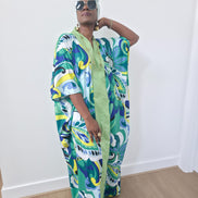 Emerald Paisley Boubou Kaftan with a solid lime-green center panel and a vibrant green, blue, and yellow paisley print. -Front View