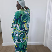 Emerald Paisley Boubou Kaftan with a solid lime-green center panel and a vibrant green, blue, and yellow paisley print. - Back View