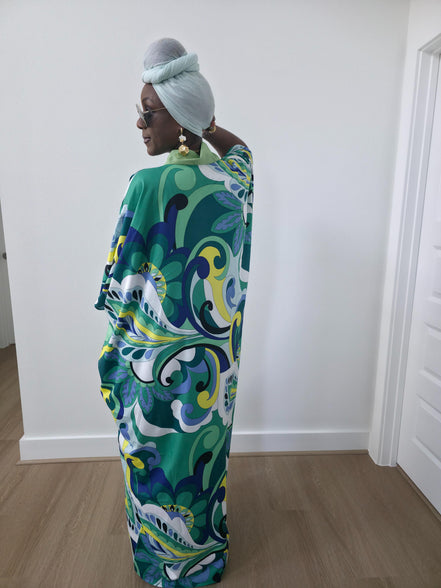 Emerald Paisley Boubou Kaftan with a solid lime-green center panel and a vibrant green, blue, and yellow paisley print. - Back View