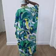 Emerald Paisley Boubou Kaftan with a solid lime-green center panel and a vibrant green, blue, and yellow paisley print. - Full Back View