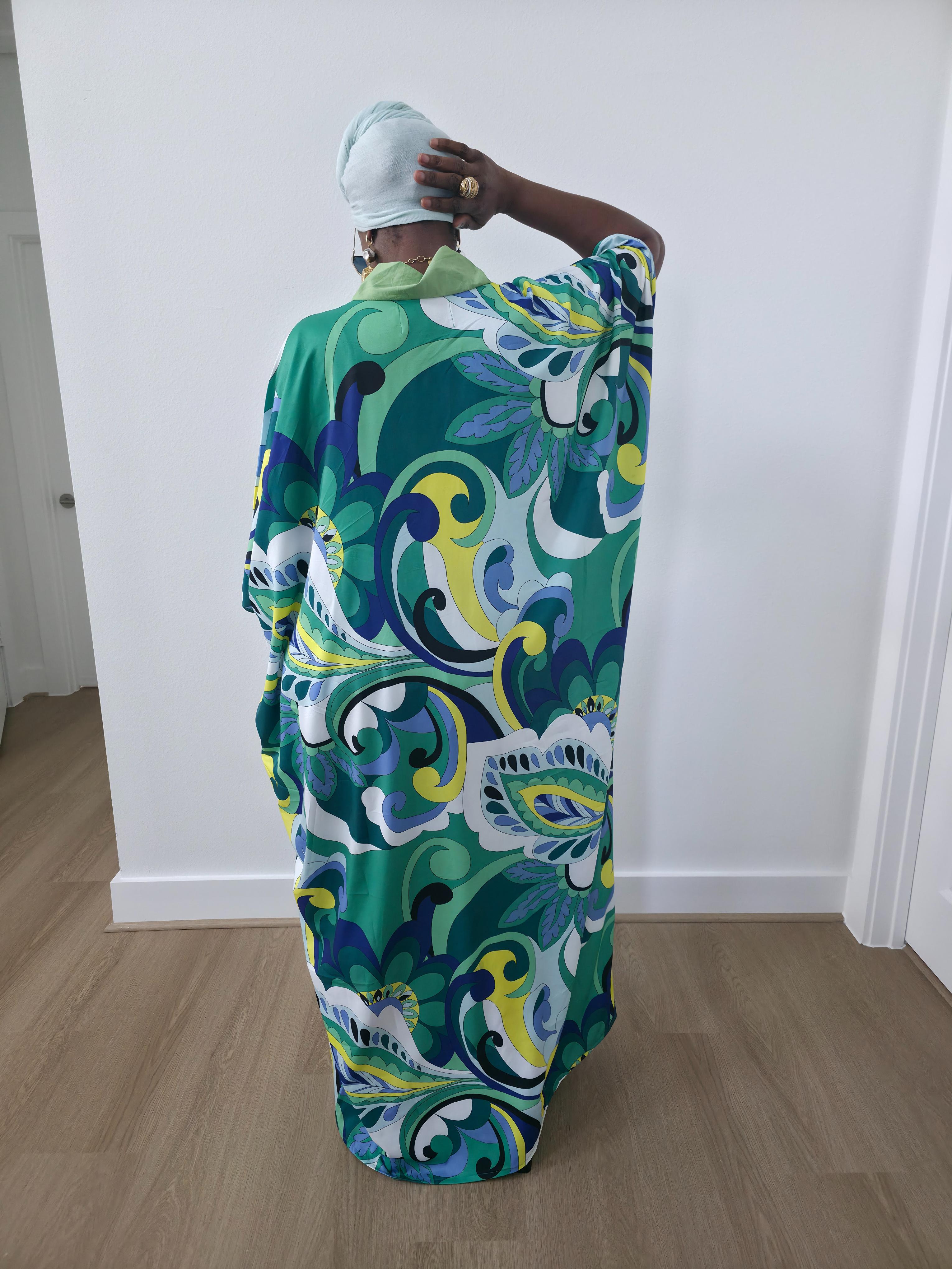 Emerald Paisley Boubou Kaftan with a solid lime-green center panel and a vibrant green, blue, and yellow paisley print. - Full Back View