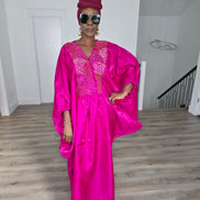 Fuchsia Brilliance Boubou Kaftan in deep pink silk-satin with an intricate gold embroidered V-neckline. - Front View