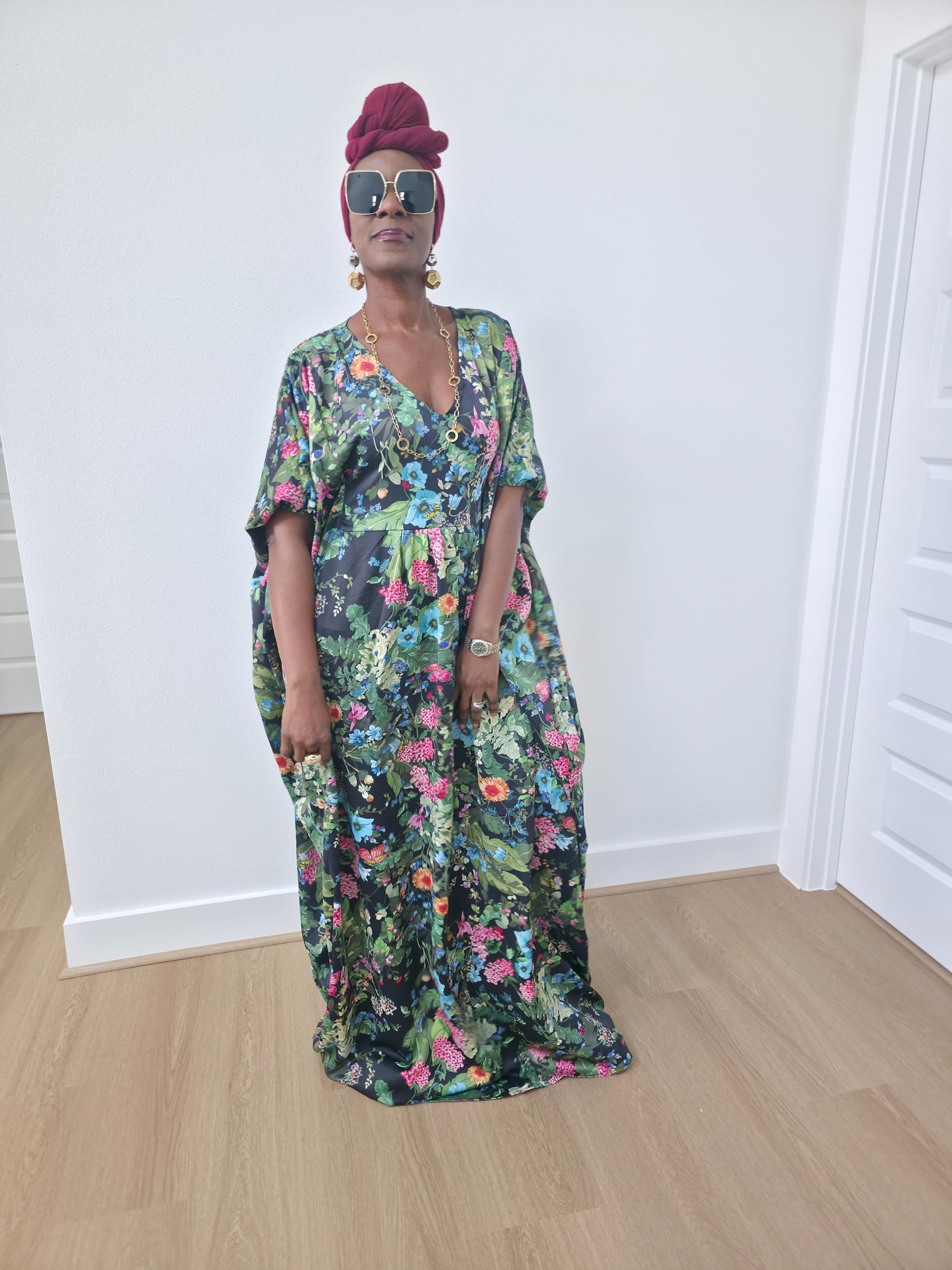 Green floral boubou kaftan featuring a vibrant pink and blue botanical pattern with a flowing, floor-length silhouette.-Women's Casual Wear
