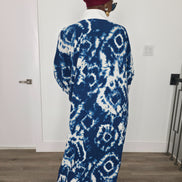 Ink & Alabaster Boubou Kaftan featuring a deep blue and white tie-dye circular pattern with a crisp white V-neck collar. Back View