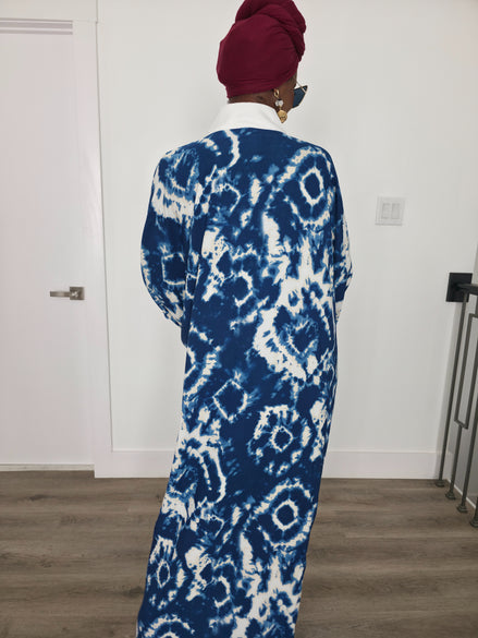 Ink & Alabaster Boubou Kaftan featuring a deep blue and white tie-dye circular pattern with a crisp white V-neck collar. Back View