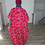 Midnight Poppy Boubou Kaftan in deep red with a white and blue floral print, featuring a navy blue collar and matching burgundy headwrap. Back View