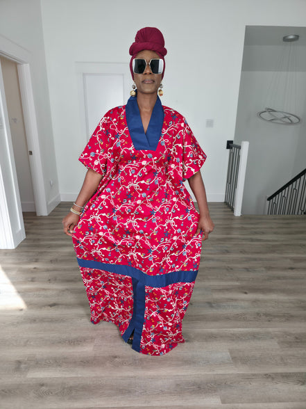 Midnight Poppy Boubou Kaftan in deep red with a white and blue floral print, featuring a navy blue collar and matching burgundy headwrap. Front View