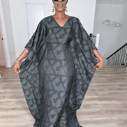 Shadowed Flint Boubou Kaftan featuring a dark grey and black geometric abstract print with a matching black headwrap. Front View