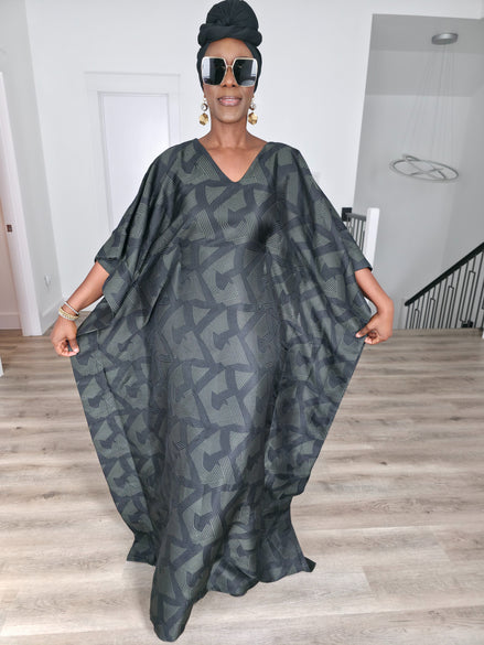 Shadowed Flint Boubou Kaftan featuring a dark grey and black geometric abstract print with a matching black headwrap. Front View