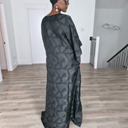 Shadowed Flint Boubou Kaftan featuring a dark grey and black geometric abstract print with a matching black headwrap. Back View