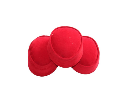 Kufi Hat  featuring a circular crown made of rich crimson red velvet with a structured, matching side band. Stacked up into to a pile of 3