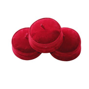 Kufi Hat featuring a circular crimson red velvet crown with a structured side band and a small top tassel.