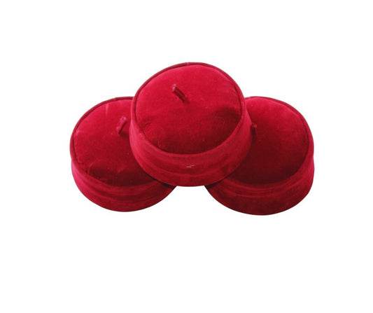 Kufi Hat featuring a circular crimson red velvet crown with a structured side band and a small top tassel.