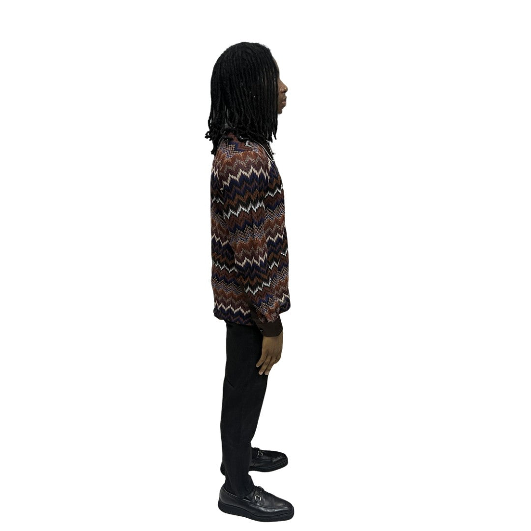 Long Sleeve Shirt featuring an intricate earth-tone zigzag pattern, a dark brown contrasting pointed collar with white piping, and a button-down front.