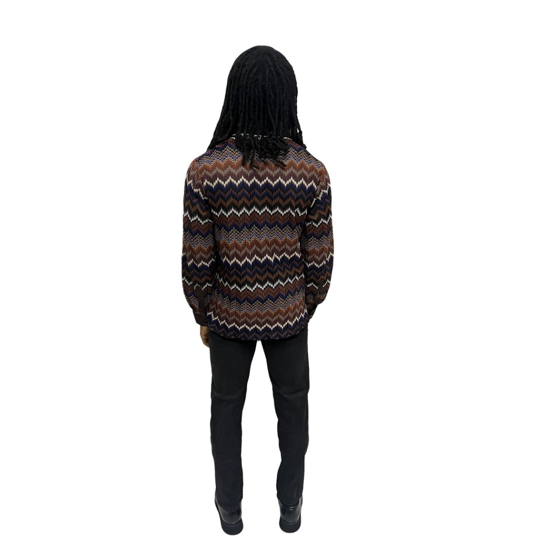 Long Sleeve Shirt featuring an intricate earth-tone zigzag pattern, a dark brown contrasting pointed collar with white piping, and a button-down front.