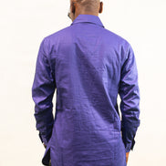 Long Sleeve Shirt featuring a vibrant royal blue cotton tunic with a prominent black central zipper, two chest pockets, and a classic collar. Back View.