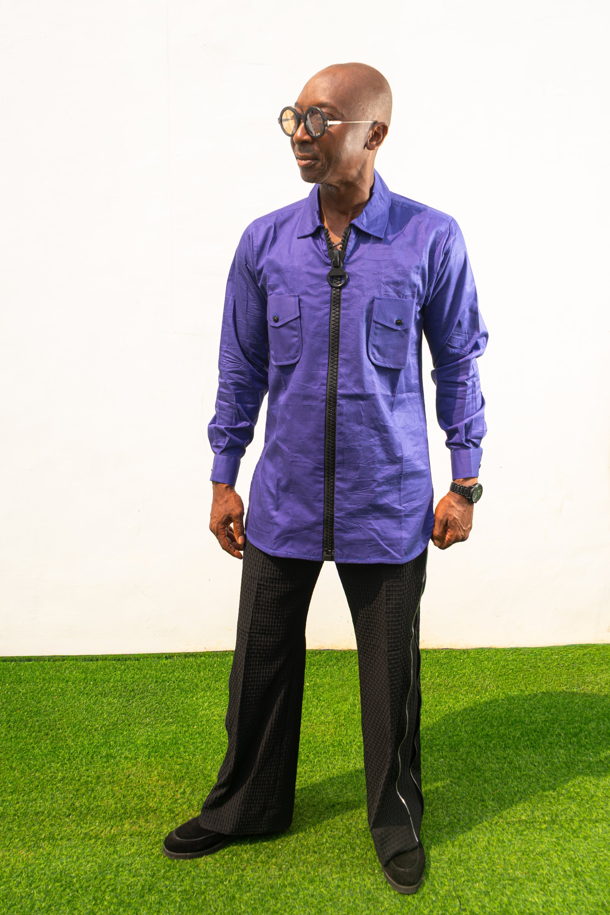 Long Sleeve Shirt featuring a vibrant royal blue cotton tunic with a prominent black central zipper, two chest pockets, and a classic collar.