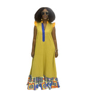 Maxi Dress featuring a mustard yellow body with blue neck detail, orange ruffled sleeves, and a colorful patterned tiered hem.