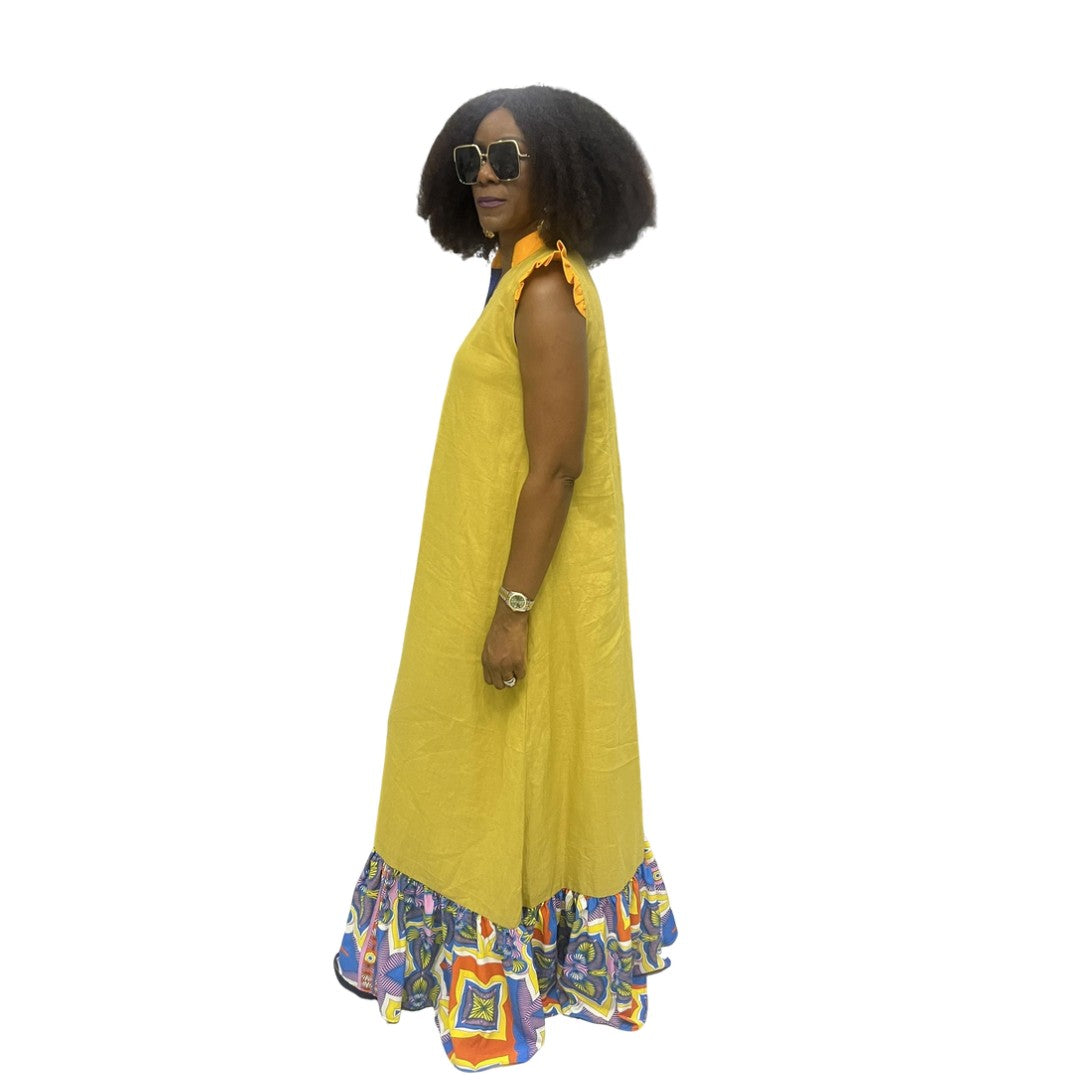 Maxi Dress featuring a mustard yellow body with blue neck detail, orange ruffled sleeves, and a colorful patterned tiered hem.