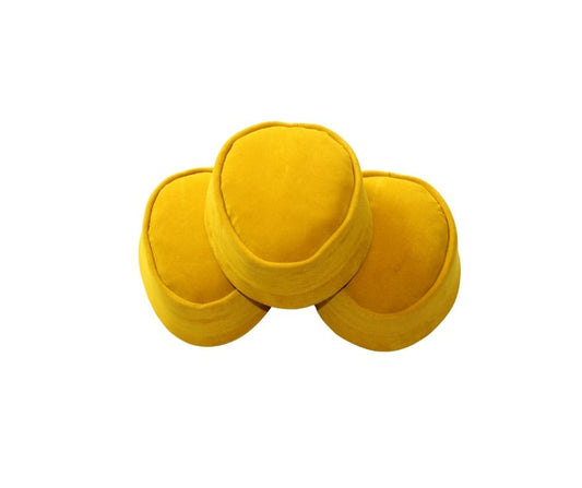 Nze Cap featuring a mustard yellow velvet body and a classic oval-shaped crown