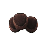 Nze Cap featuring a deep brown velvet body and a classic oval-shaped crown