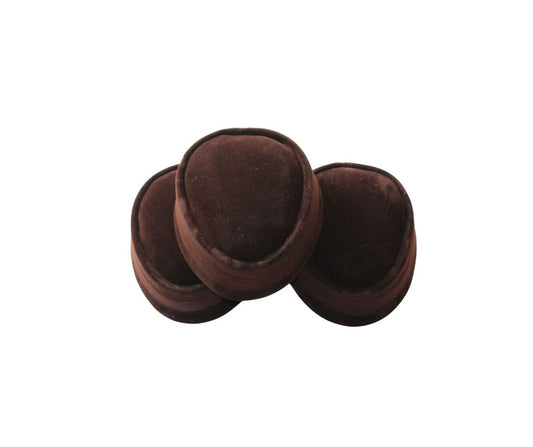 Nze Cap featuring a deep brown velvet body and a classic oval-shaped crown