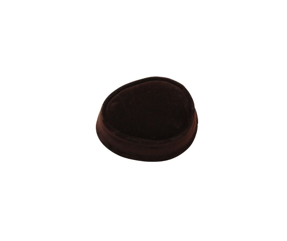 Nze Cap featuring a deep brown velvet body and a classic oval-shaped crown