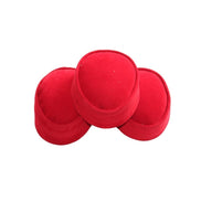 Nze Cap featuring a vibrant ruby red velvet texture, a structured oval top, and a matching fabric-wrapped brim.