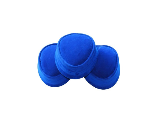 Nze Cap featuring a rich royal blue velvet texture, an oval-shaped crown, and a reinforced circular brim.