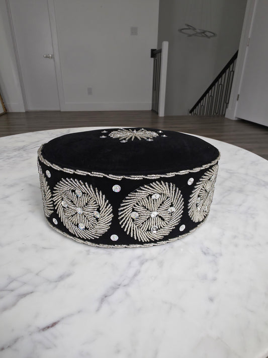 Beaded Ozo Cap featuring black velvet, circular silver beadwork embroidery, and shimmering stone accents.