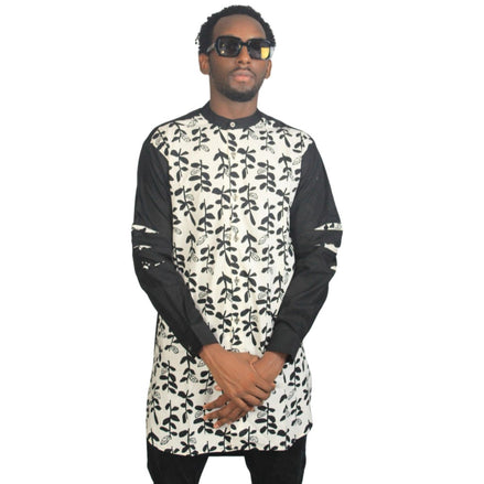 Patterned Shirt featuring a black and white floral leaf pattern on the torso with contrasting solid black long sleeves and a mandarin collar.