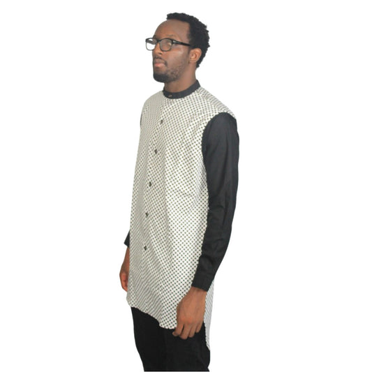 Patterned Shirt featuring a white and black micro-dotted torso with solid black sleeves and a mandarin collar. Side View