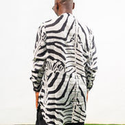 Patterned Shirt featuring a long-sleeve white tunic with bold black zebra-inspired patterns, a buttoned neckline, and a straight hem. Back View