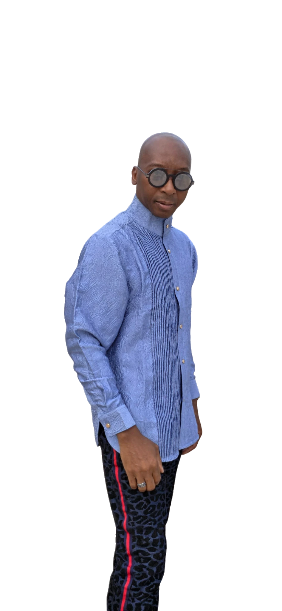 Senator-Style Shirt featuring dusty blue textured jacquard fabric, vertical central pleating, high mandarin collar, and buttoned long-sleeve silhouette.