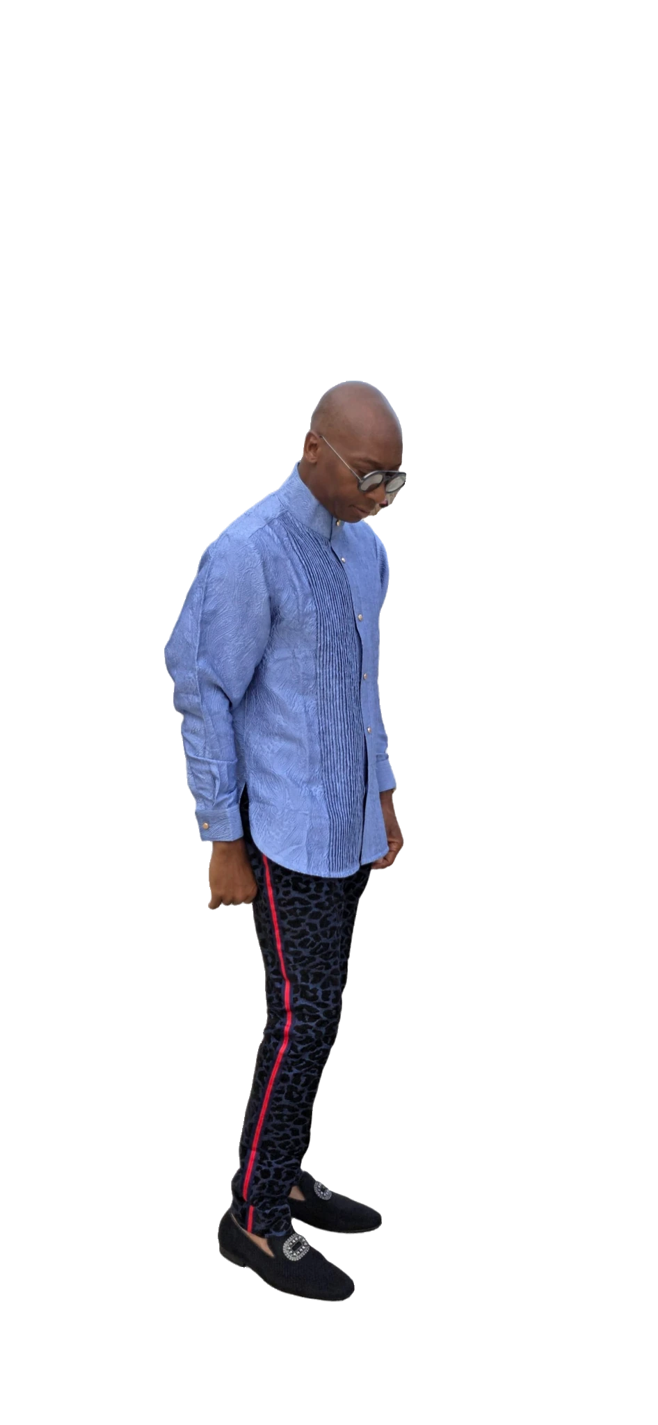 Senator-Style Shirt featuring dusty blue textured jacquard fabric, vertical central pleating, high mandarin collar, and buttoned long-sleeve silhouette.