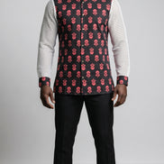 Shirt featuring a long-sleeved silhouette with a black and coral-pink floral Ankara print torso, accented by white mesh net sleeves with matching printed cuffs.