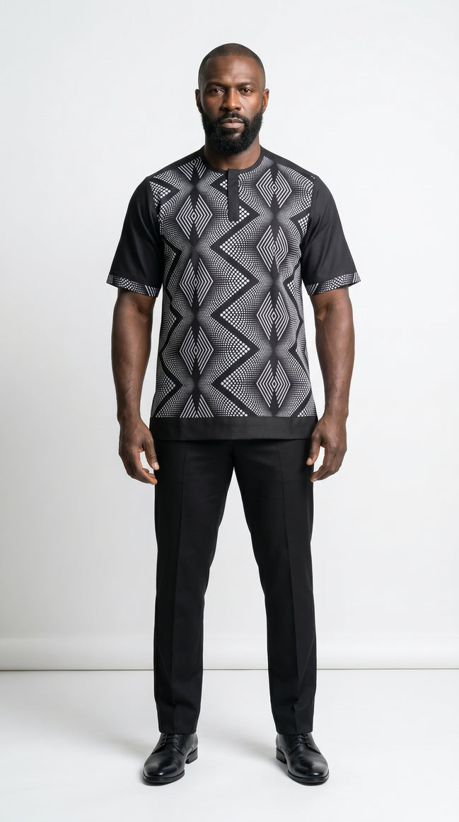 Shirt featuring a short-sleeved silhouette with a black and white optical diamond Ankara print on the chest, contrasted by solid black sleeves, collar, and side panels.
