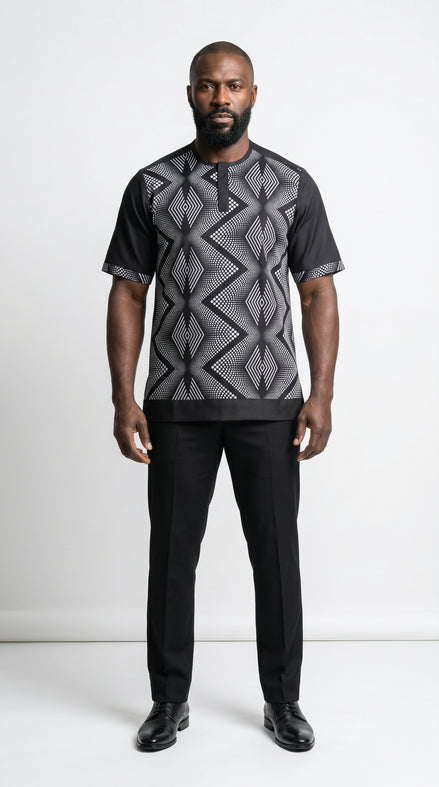 Shirt featuring a short-sleeved silhouette with a black and white optical diamond Ankara print on the chest, contrasted by solid black sleeves, collar, and side panels.