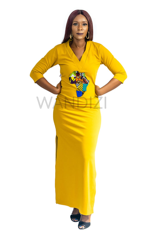 Tank Dress featuring a fitted yellow V-neck maxi dress adorned with a central multi-colored geometric African print map patch on the chest and high side slits