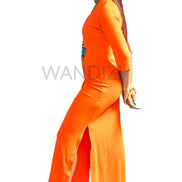 Tank Dress featuring a fitted orange V-neck maxi dress adorned with a central multi-colored geometric African print map patch on the chest and high side slits