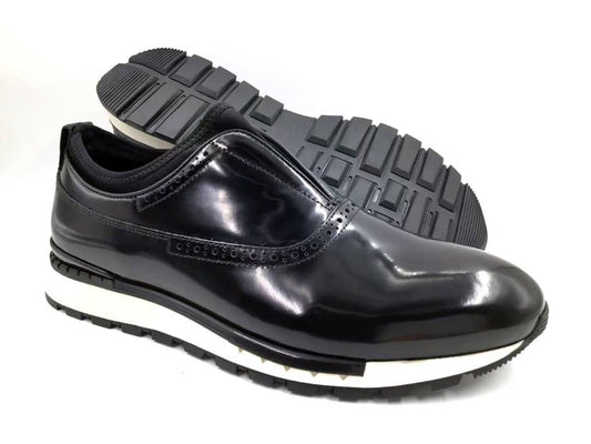 The Hybrid Brogue Runner with its high-shine black leather upper, traditional brogue perforations, black neoprene ankle collar, and a thick black and white high-traction sole.